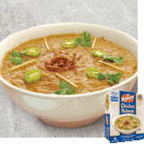 A white bowl filled with chicken Haleem with cilantro, sliced jalapeños, and fried onion on top. A package of Kaiser Chicken Haleem is overlaid in the bottom right corner.