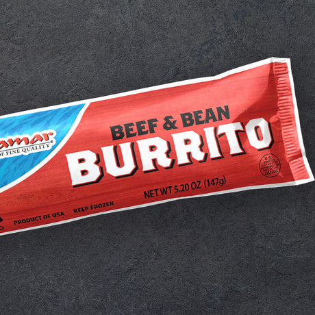 Red and blue package of beef and bean burrito on a dark background