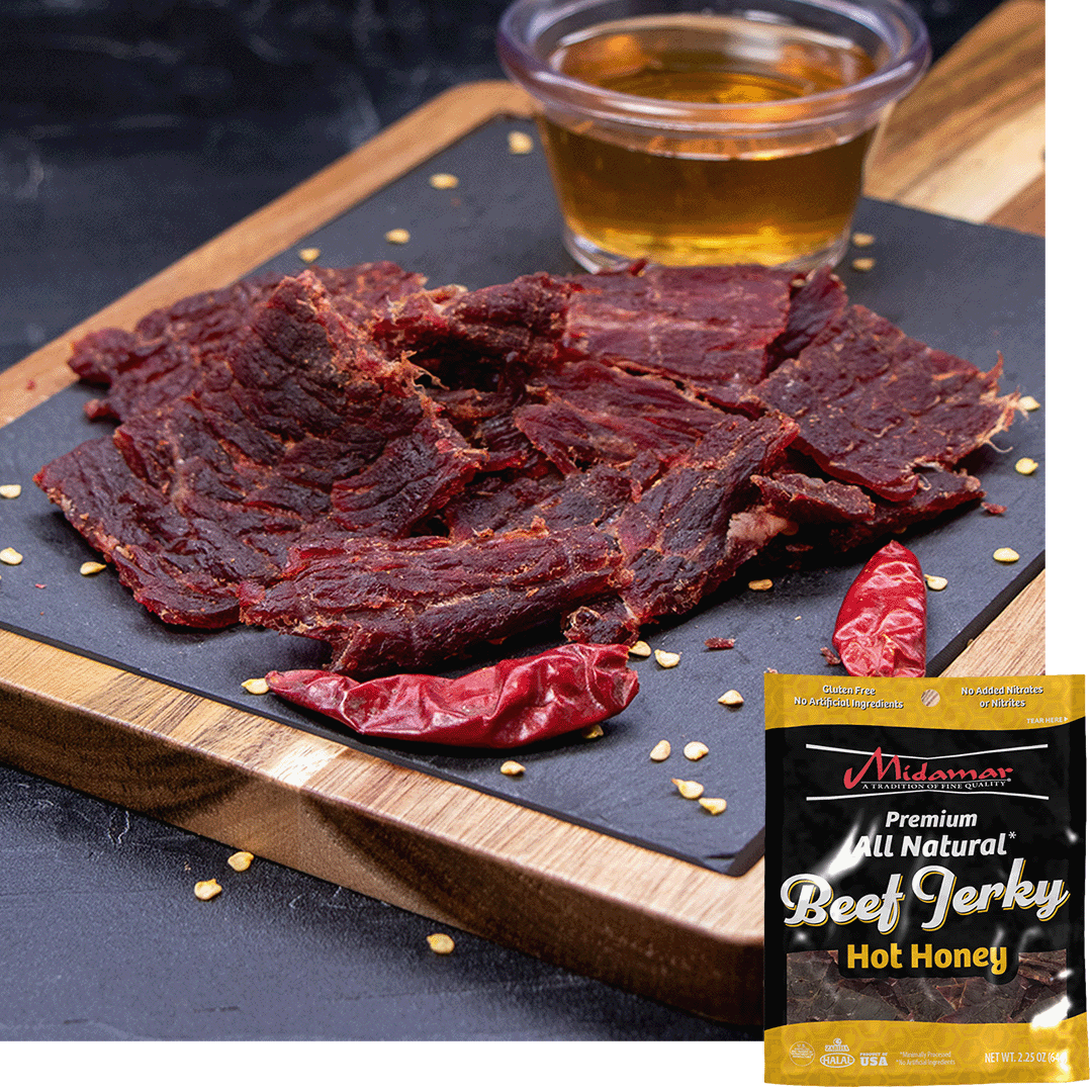 Midamar halal beef jerky strips sit on a cutting board surrounded by dried peppers and seeds, behind the jerky is a clear cup of honey overlayed is a picture of the package