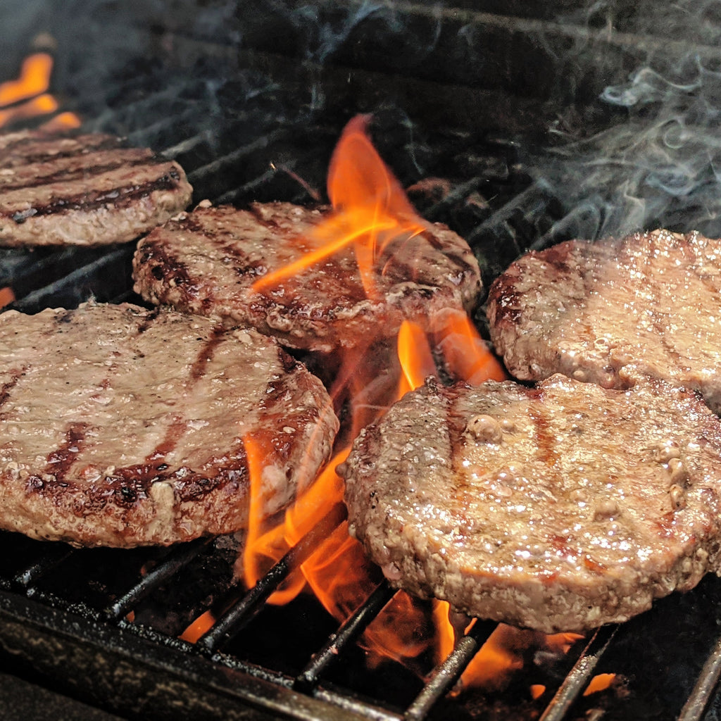 Midamar Halal Beef burgers on grill